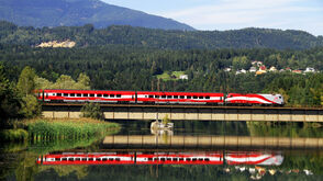 The "Austrian Train" travels through scenic landscape