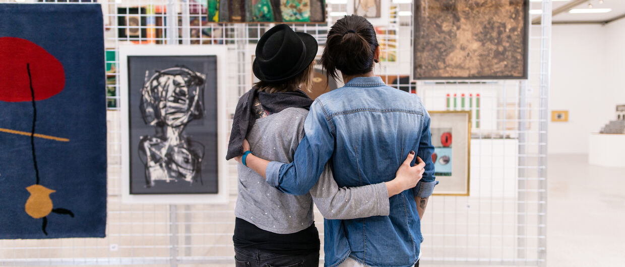 Couple admires exhibition
